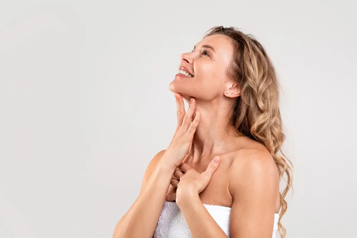 Woman smiling after a Kybella treatment for a contoured jawline in Laguna Hills, CA